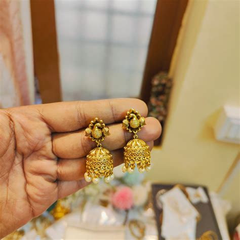 Antique peacock jhumka with pearl drops – Kankanam - South India Jewellery