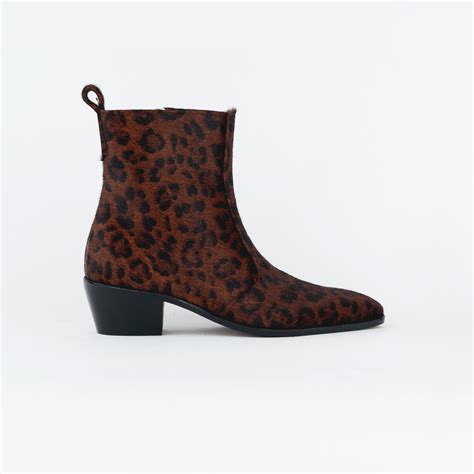 CHEETAH HAIR ON BOOTS WITH A SQUARE POINTED TOE AND TRAPEZOID HEEL ...