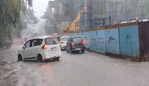 Mumbai Faces Heavy Rainfall And Widespread Disruptions, Airports And ...