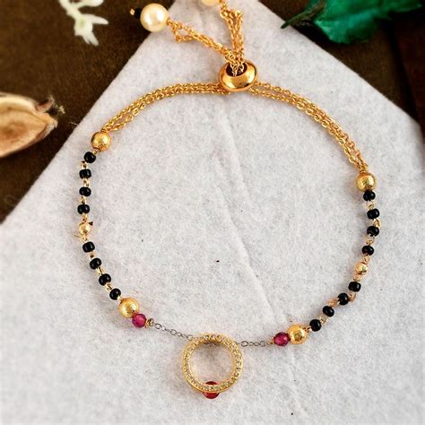 Buy Shoshaa Gold-Plated Black and Pink Beaded Circular Shaped Charm ...