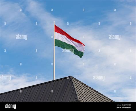 Hungarian flag on a government building rooftop. Symbol of the country ...
