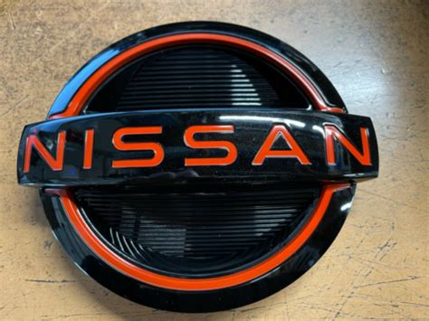 Buy New Oem 2022-2024 Nissan Frontier Front Grille Emblem - Red Accent ...