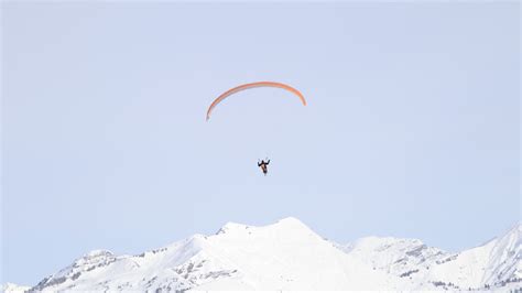 Download wallpaper 3840x2160 paraglider, man, flight, mountains ...