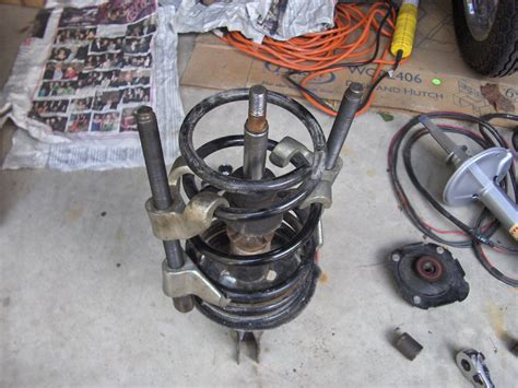 Spring Suppressor for Changing Front Struts 的图像结果