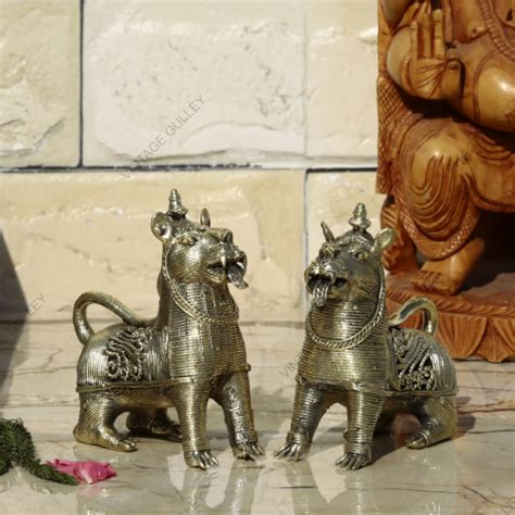 Brass Dhokra Sitting Lion - Set of 2 | Garuda Life