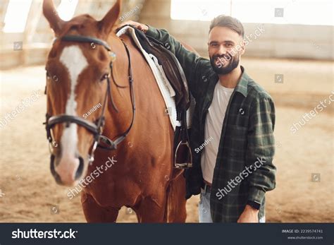 Installing Saddle Young Man Horse Hangar Stock Photo 2239574741 ...