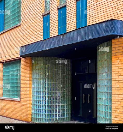 Streamline Moderne entrance with curved glass block walls and vertical ...