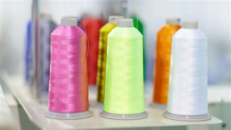 Image result for How to Use Large Thread Spool On Machine