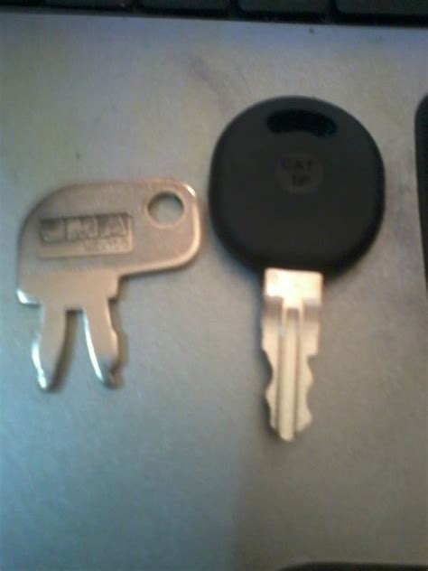 Image result for Caterpillar Telehandler Key