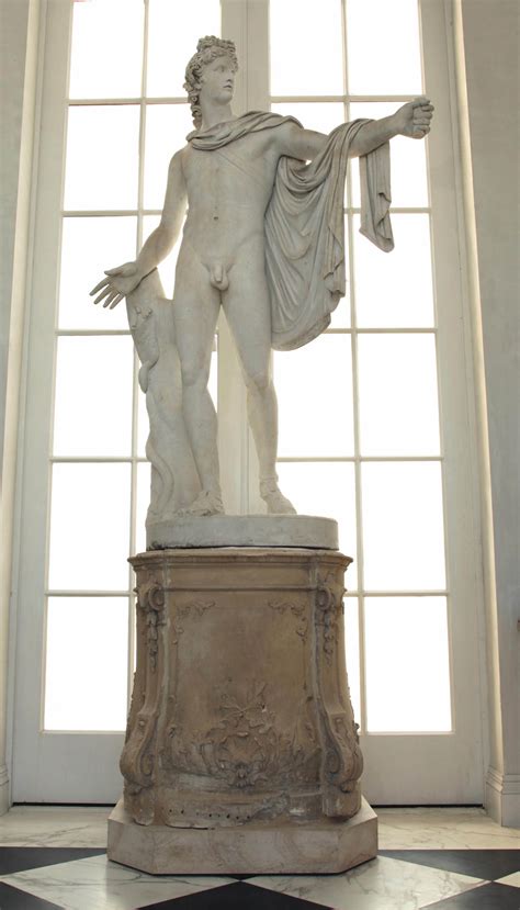 A MONUMENTAL MARBLE FIGURE OF THE APOLLO BELVEDERE