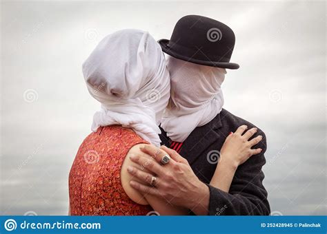 Man Kissing Woman with White Fabrics on Their Heads Stock Image - Image ...