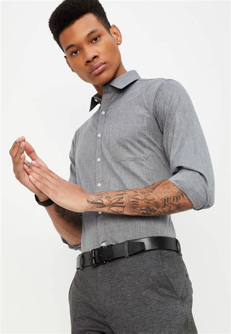 Buy Men Regular Fit Solid Formal Shirt Online at just Rs. 699.0 ...