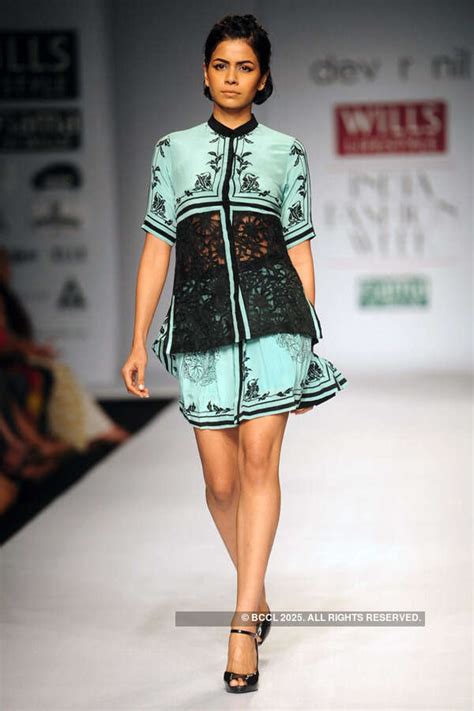 Tamara Moss walks the ramp for fashion designers Dev r Nil on Day 3 of ...