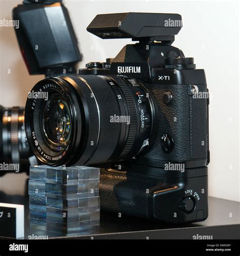 The Fujifilm X-T1, showcased at CP+ 2014, features advanced imaging ...
