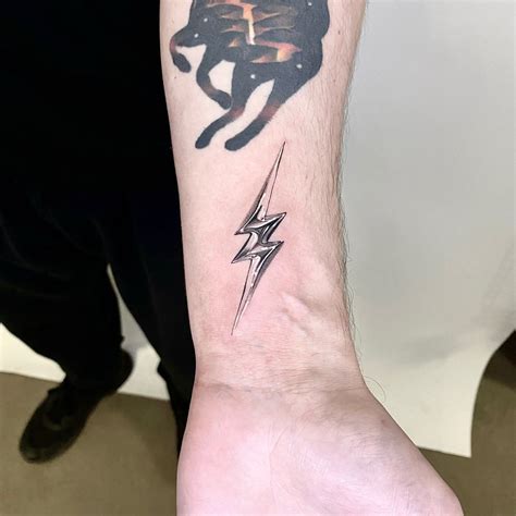Lightning Bolt Face Tattoo Meaning