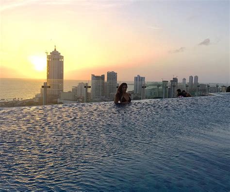 Photos of Erika Packard’s beach vacation are so hot, ice caps are ...