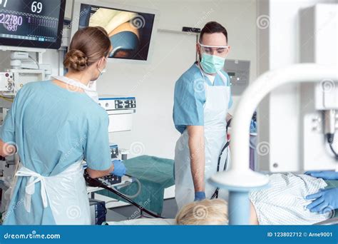 Internist Doctors during Stomach Examination Stock Photo - Image of mouth, nurse: 123802712