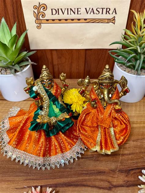 Divine Vastra Orange Lakshmi Ganesh Ji Poshak Price in India - Buy ...