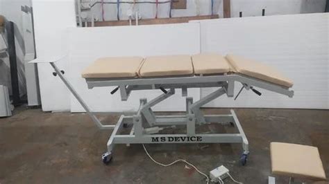Traction Tables - Four Fold Traction Table Manufacturer from New Delhi