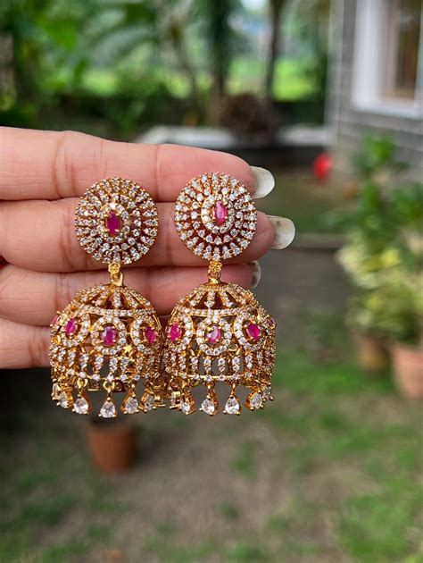 Premium quality ad stone hanging jhumka product code E24 – ARACKAL ...