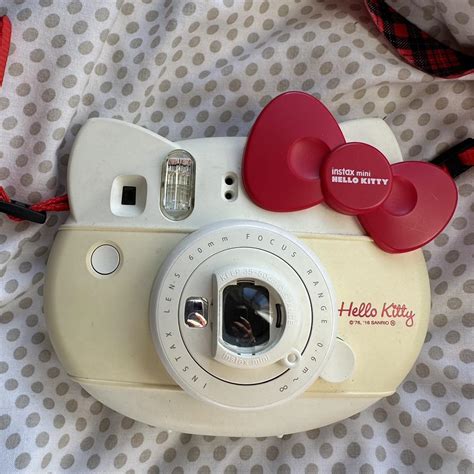 Hello Kitty Instax mini camera in cream and red... - Depop