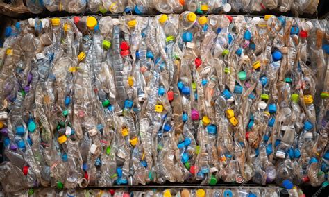 Premium Photo | Old plastic bottles that have been used are squeezed ...