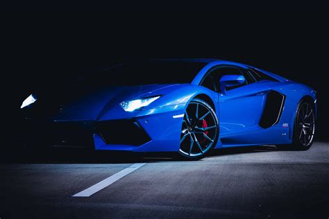 Download A Blue Sports Car Wallpaper | Wallpapers.com