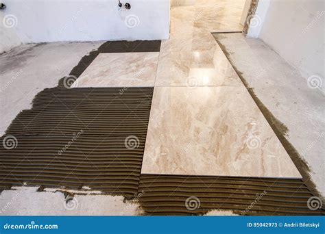 Ceramic Tiles. Floor Tiles Installation Stock Image - Image of manual ...