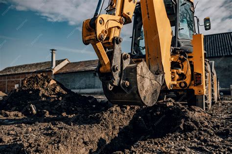 Image result for Backhoe Digging Hole