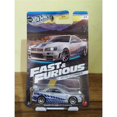 Hot Wheels FNF Nissan Skyline GT-R R34 Plata Brian PROTECTOR Libre ...