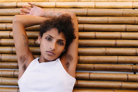 naked with hard nipples and stubbly armpit hair