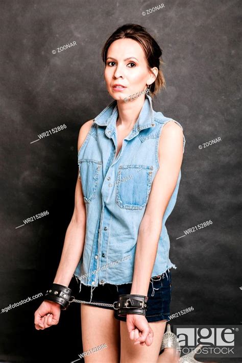 Arrest and jail. Criminal woman prisoner girl in handcuffs, Stock Photo ...