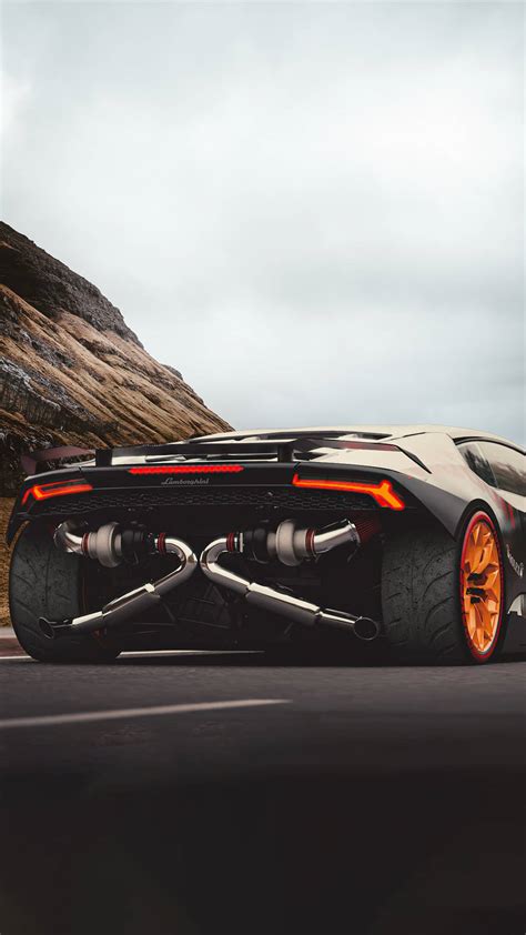 Download Black And Orange 4K Car iPhone Wallpaper | Wallpapers.com