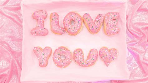 Download Aesthetic Computer Light Pink Donuts Wallpaper | Wallpapers.com