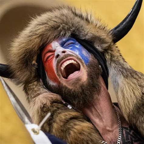 QAnon shaman sues Trump for $40,000,000,000,000 and hits out at Elon Musk