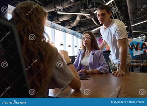 Man and a Woman are Having a Dialogue with Colleague Stock Photo ...