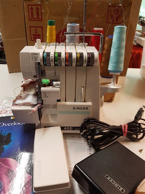 Image result for How to Thread Singer Ultralock