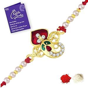 Sukkhi Fabulous Gold Plated Meenakari Ganesh Rakhi with Roli Chawal and ...