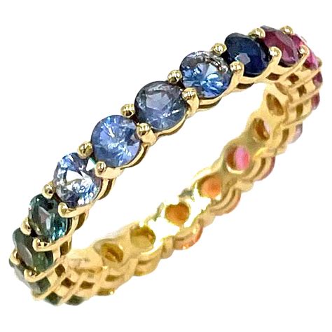 Kaleidoscope Diamond and Rainbow Sapphire 18 karat Gold Eternity Ring ...
