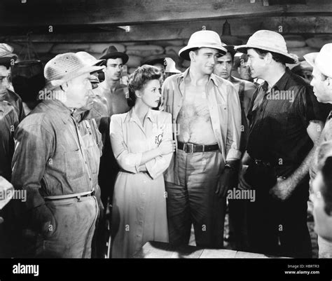 THE FIGHTING SEABEES, from left, William Frawley, Susan Hayward, John ...
