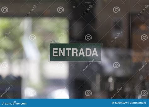 Spanish enter sign stock image. Image of close, defocused - 283015929