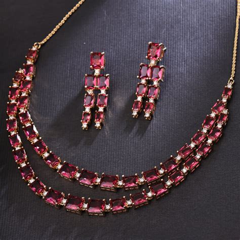 Sukkhi Glorious Gold Plated CZ Maroon Necklace Set for Women - Sukkhi.com