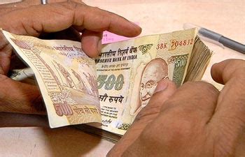Rupee slips to 68 against dollar, Sensex recovers after 450-point fall ...