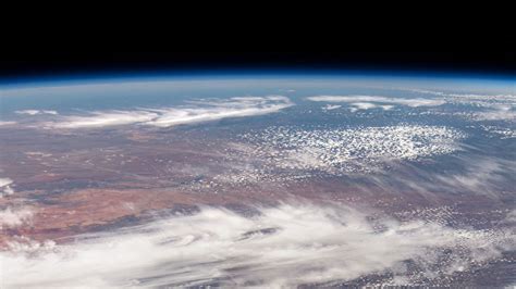 Download wallpaper 2560x1440 earth, planet, clouds, space, view from ...