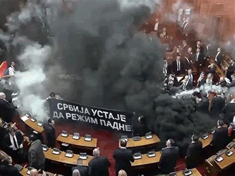 Serbian Opposition throw smoke grenades in parliament 2 MPs injured ...
