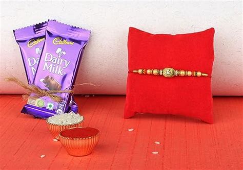 SFU E Com Premium Designer Rakhi with 2 Pieces Cadbury Dairy Milk ...