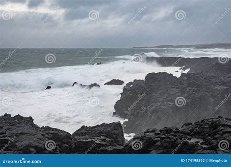Brimketill Lava Rock Pool in Iceland Storm Waves Hitting Black Basalt ...