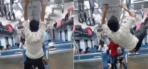 Spiderman! Boy Uses Hand-rests To Swing Across Train Compartment