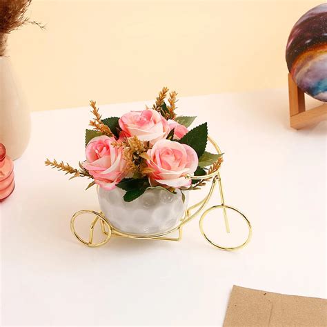 Pink Artificial Flower Pot In Golden Bicycle