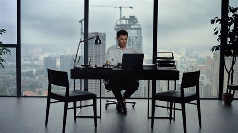 A Business Man at Computer 的图像结果